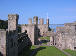 The ward of Caernarfon Castle, showing (from left to right) the Black Tower, the Chamberlain's Tower, and the Eagle Tower.